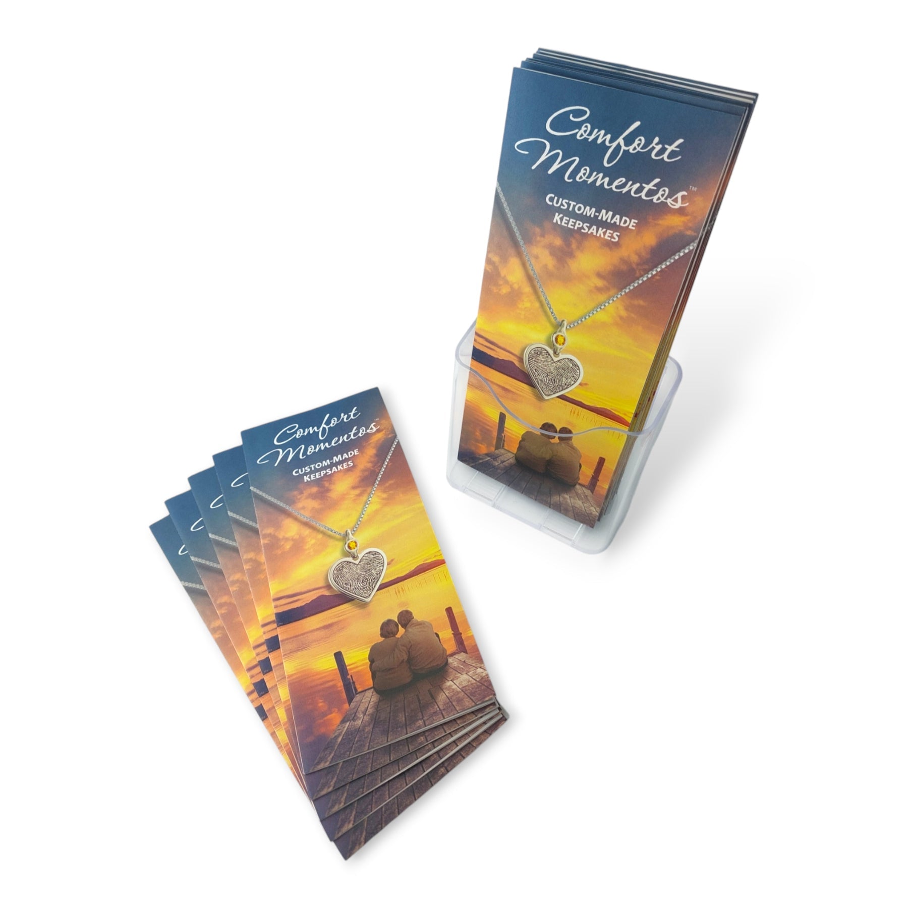 Stacks of fingerprint jewelry brochures