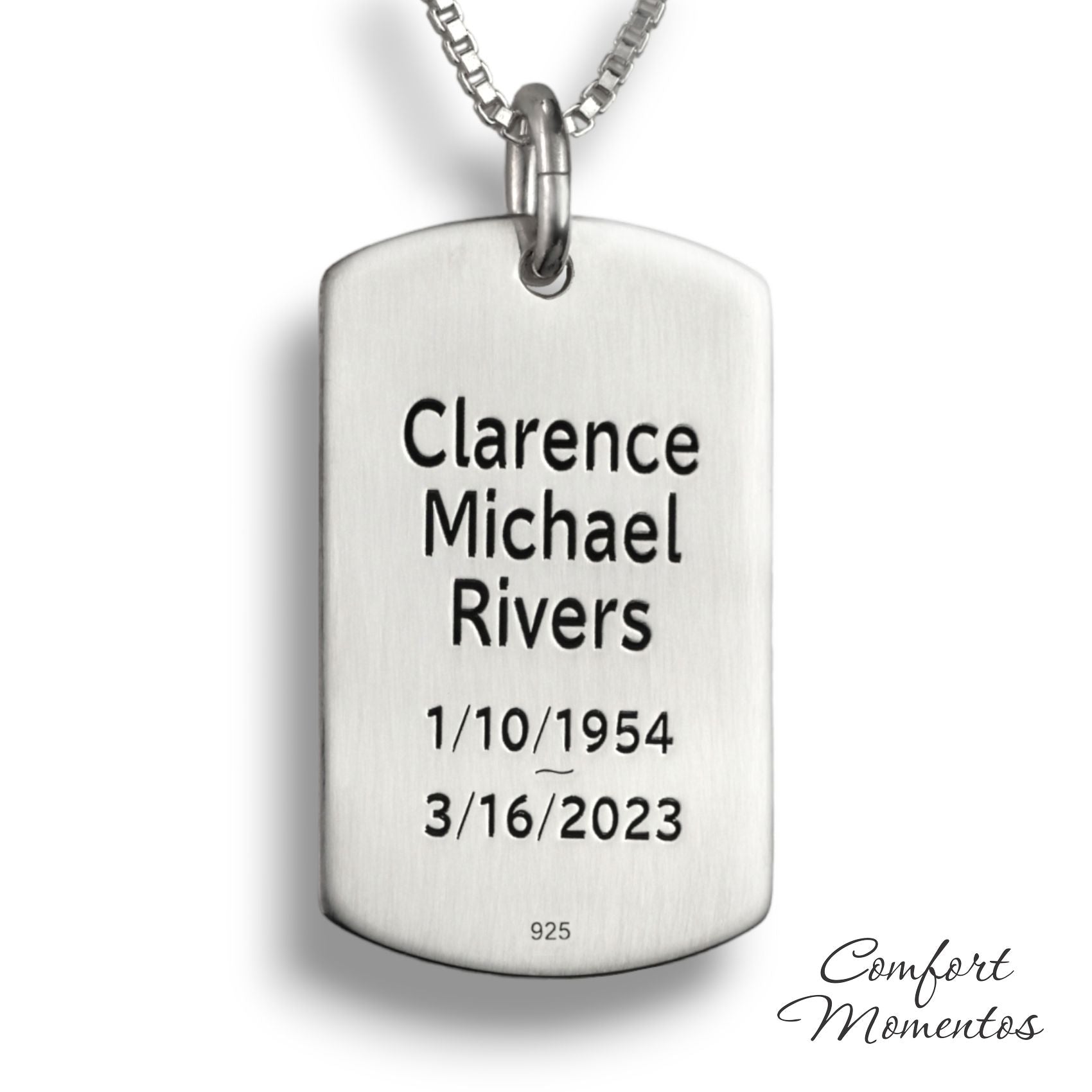 Back of silver dog tag necklace, with black example text engraved