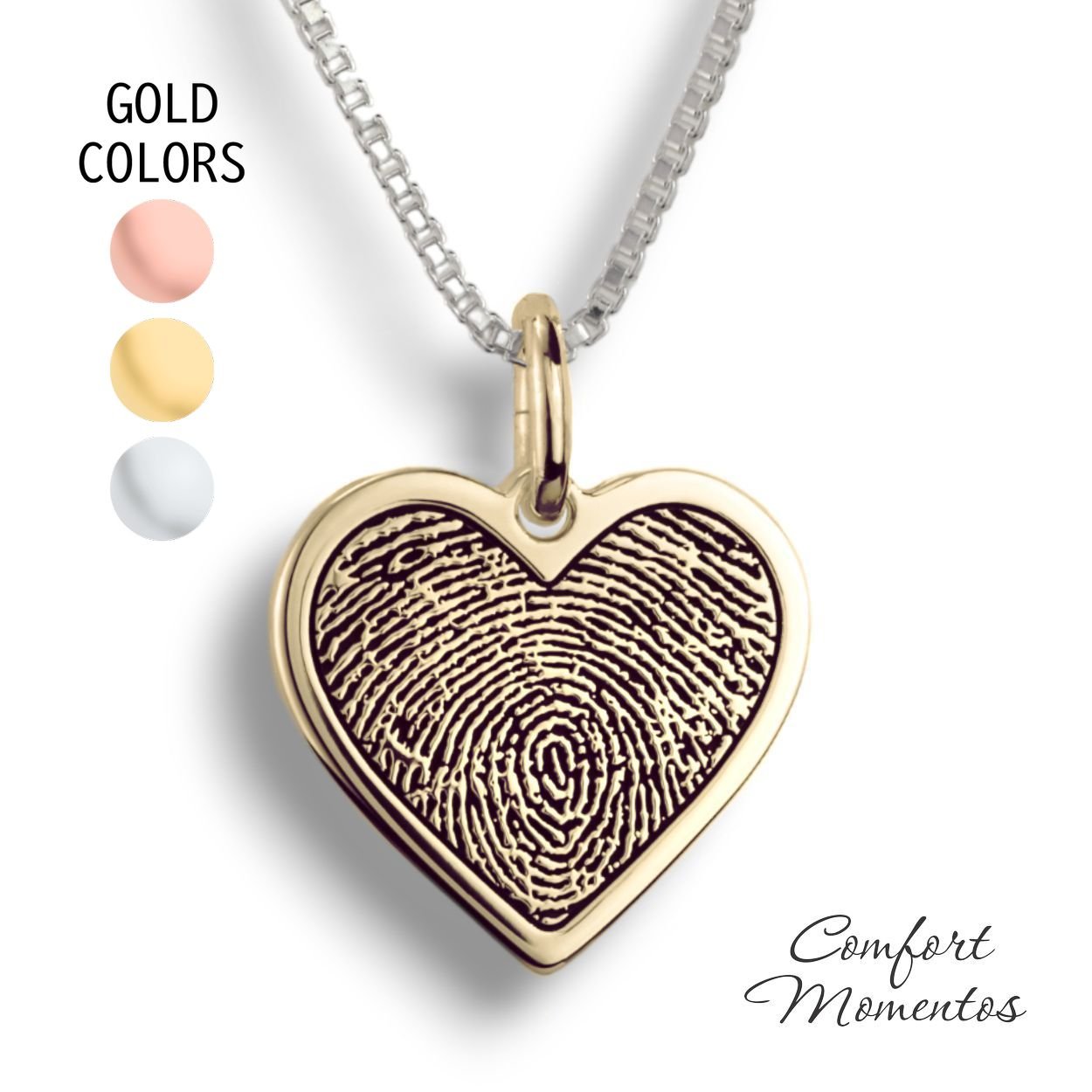 Gold heart necklace with a black fingerprint engraved