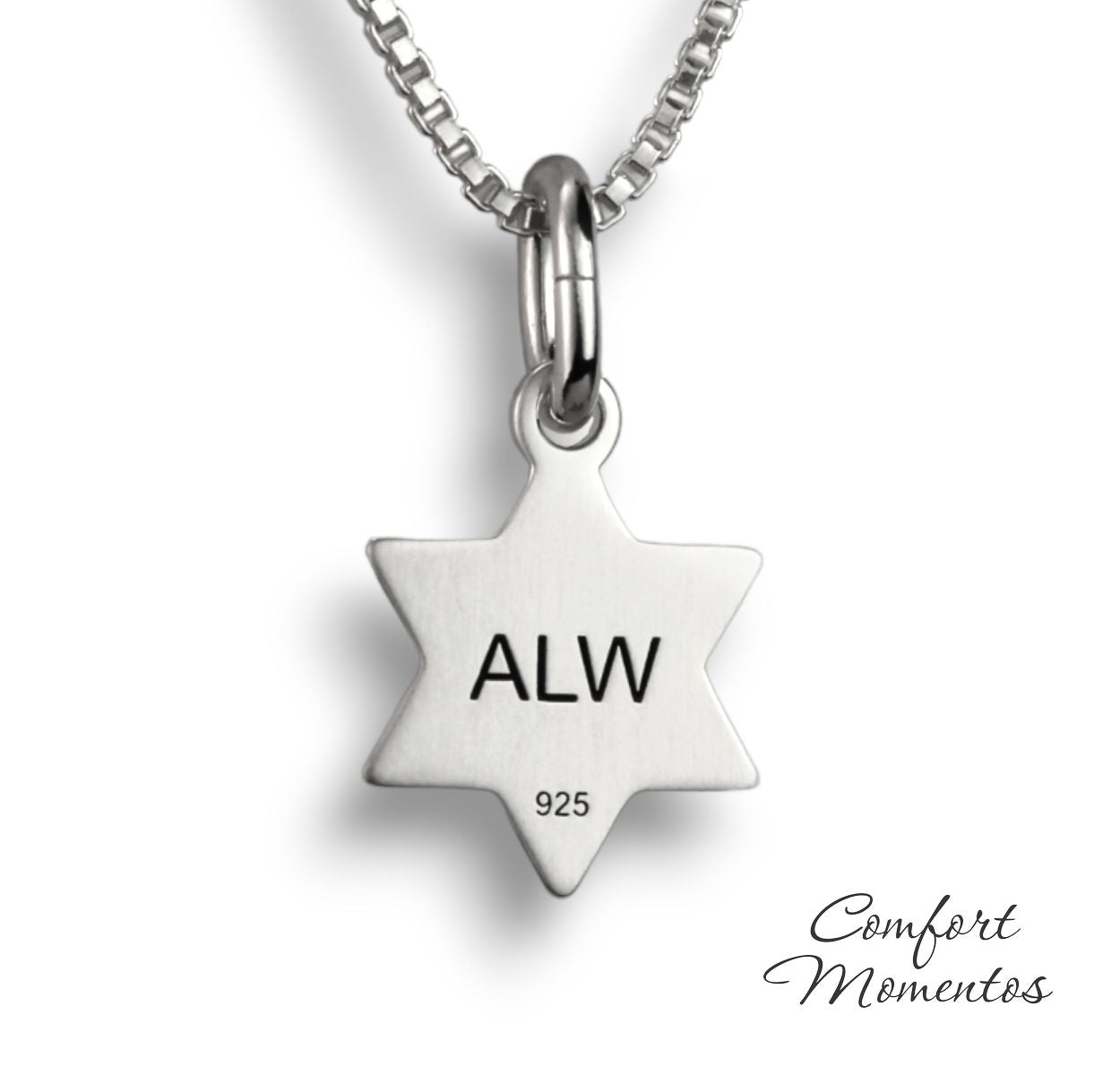 Back of small star necklace, with black example text engraved