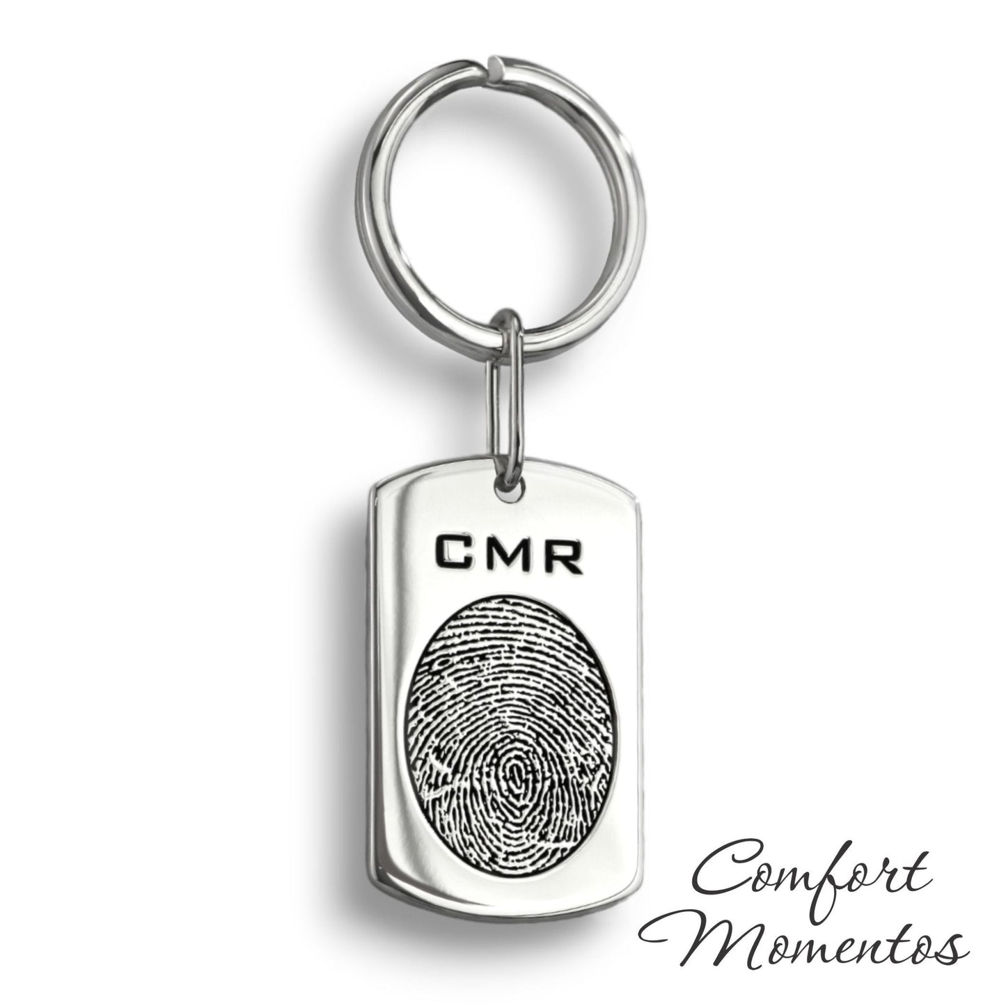 Silver dog tag keychain with a black fingerprint and initials engraved, on a round split key ring