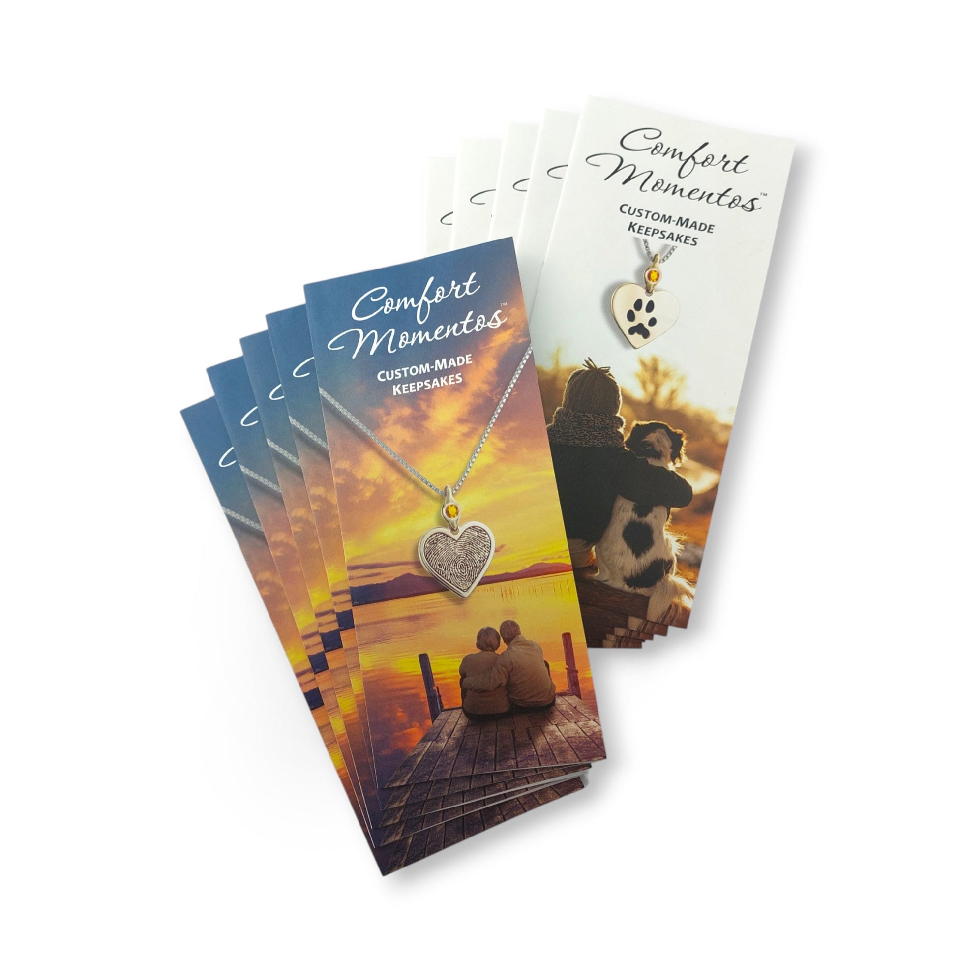 Stacks of fingerprint and pawprint jewelry brochures