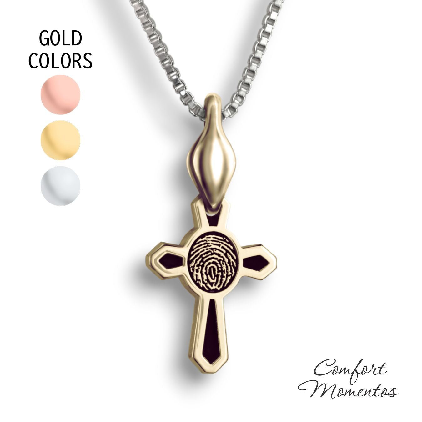 Small gold cross necklace with black fingerprint and recessed black areas, with a plain urn