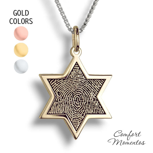 Gold star necklace with a black fingerprint engraved