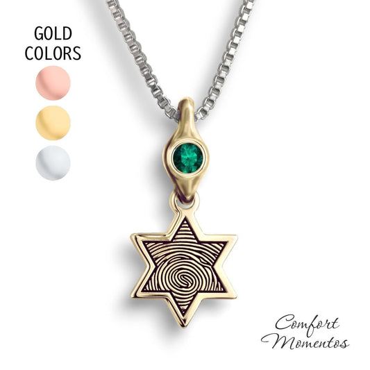 Small gold star necklace with a black fingerprint engraved, with a gemstone urn