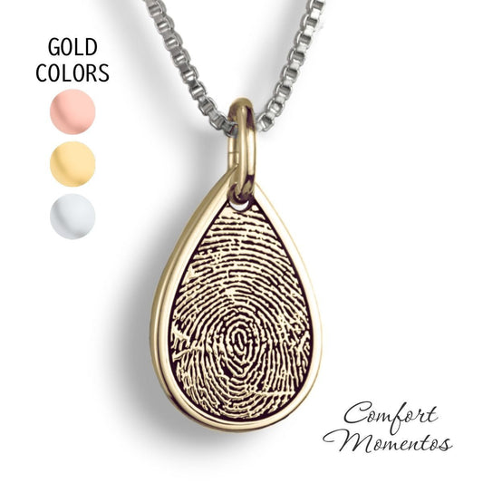 Gold teardrop necklace with a black fingerprint engraved