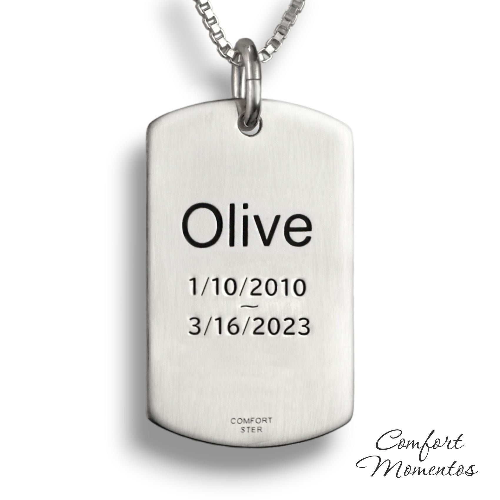 Back of silver dog tag necklace, with black example text engraved