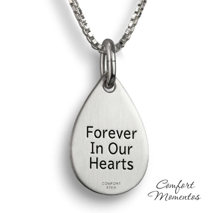 Back of silver teardrop necklace, with black example text engraved