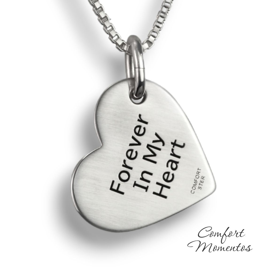 Back of silver tilted heart necklace, with black example text engraved