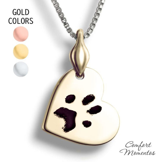 Gold tilted heart necklace with black pawprint engraving, with a plain urn