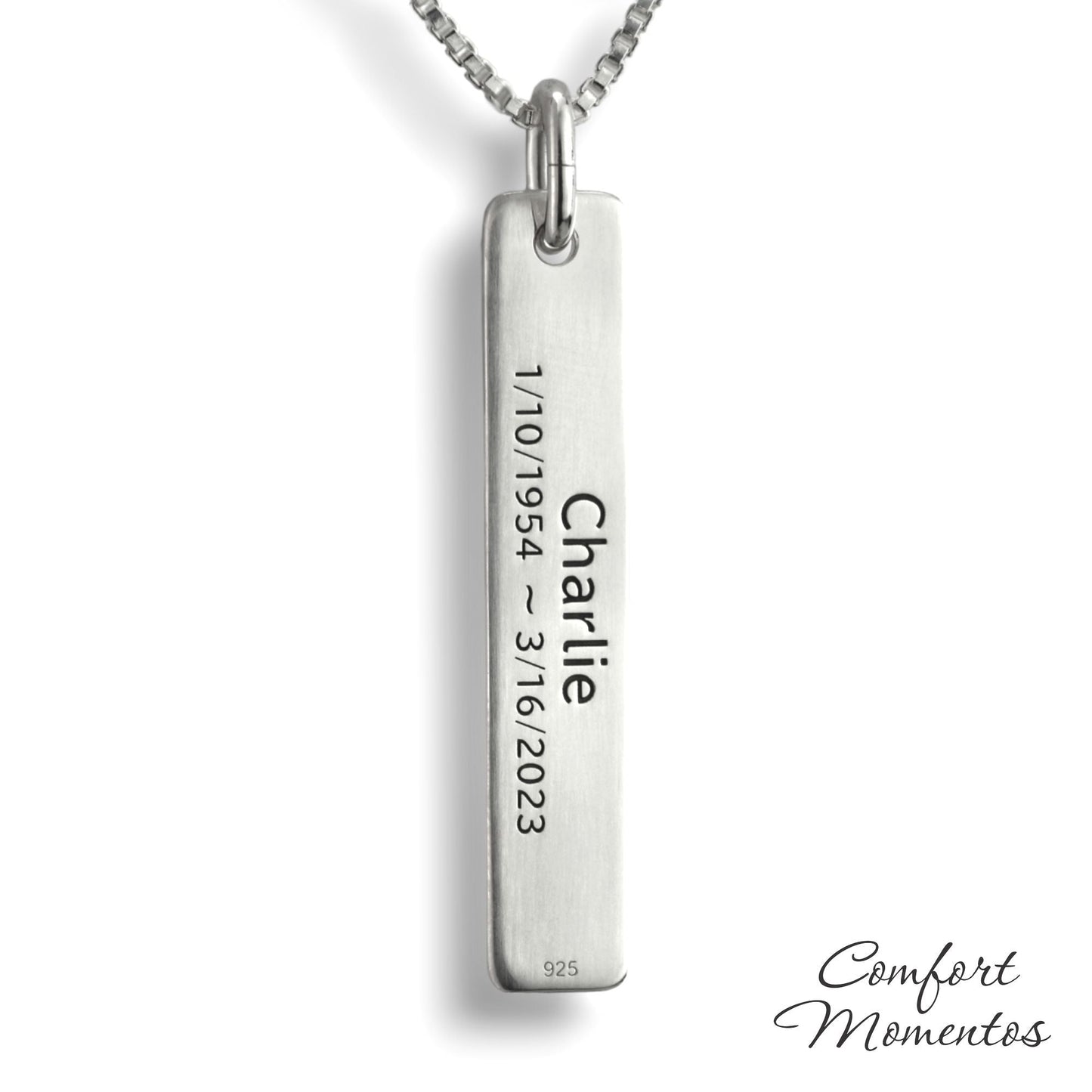 Back of silver bar necklace, with black example text engraved