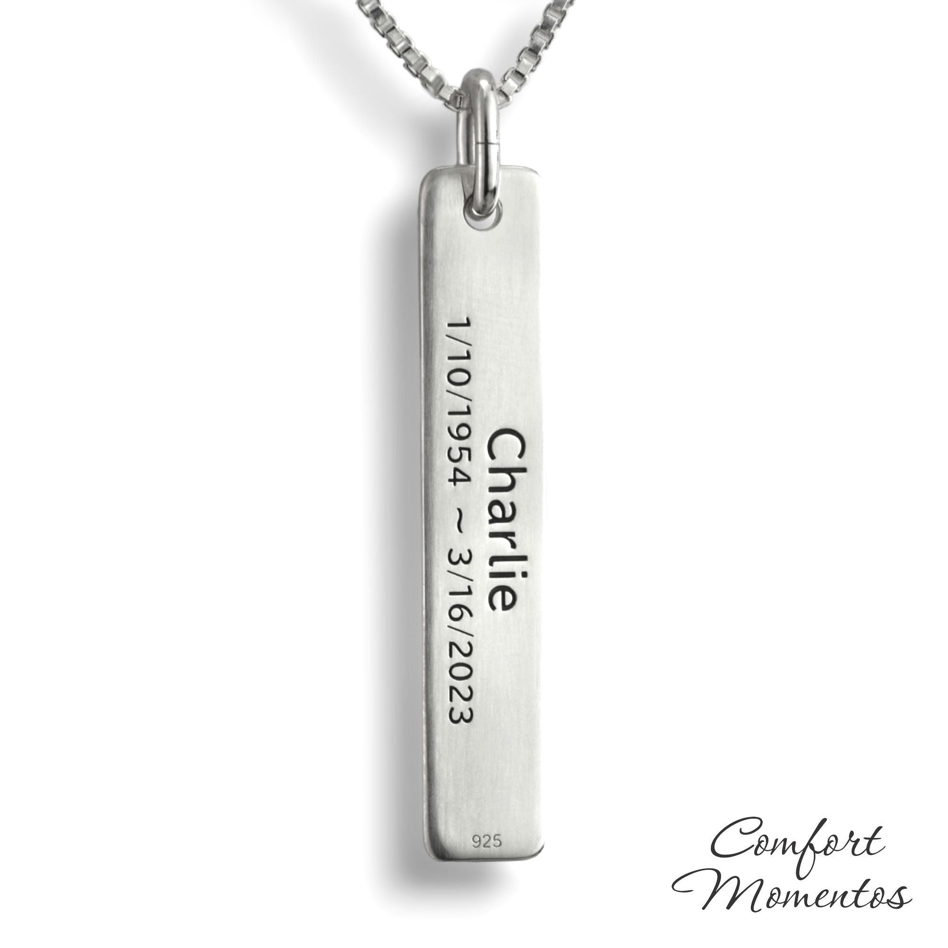 Back of silver bar necklace, with black example text engraved