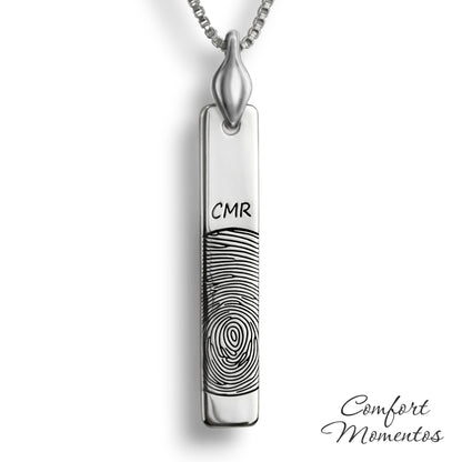 Silver vertical bar necklace engraved with a black fingerprint and initials, with a plain urn