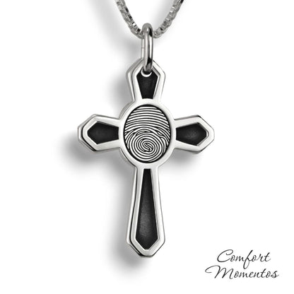 Silver cross necklace with black fingerprint and recessed black areas