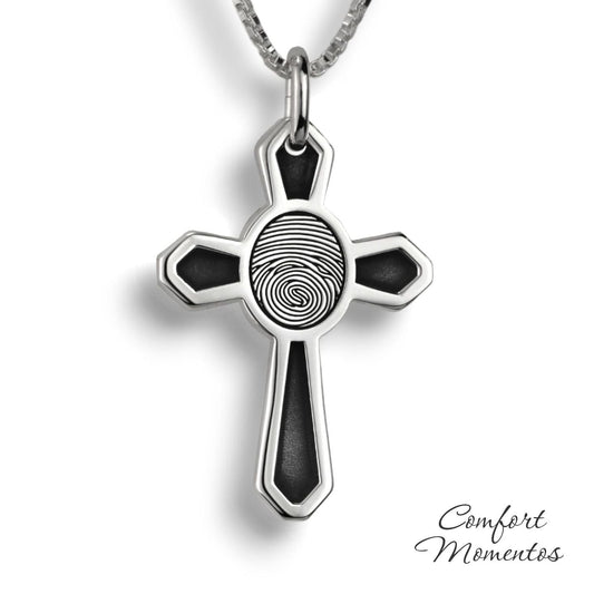 Silver cross necklace with black fingerprint and recessed black areas