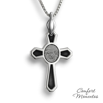 Silver cross necklace with black fingerprint and recessed black areas, with a plain urn