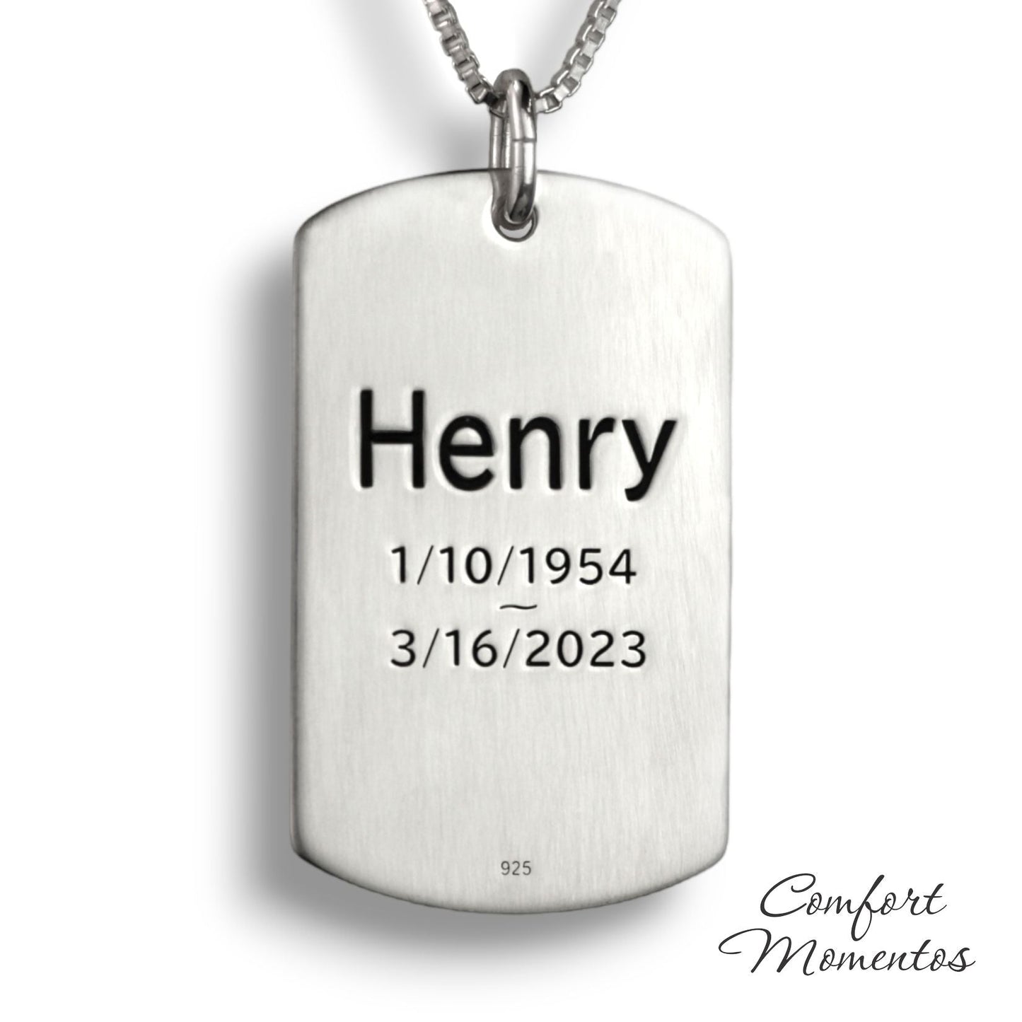 Back of large silver dog tag necklace, with black example text engraved