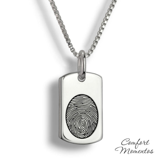 Small silver dog tag necklace with a black fingerprint engraved