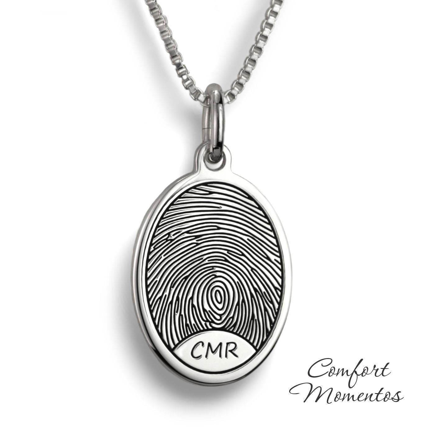Silver oval necklace with a black fingerprint and initials engraved