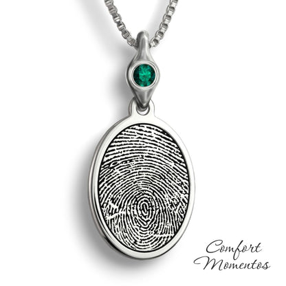 Silver oval necklace with a black fingerprint engraved, with a gemstone urn