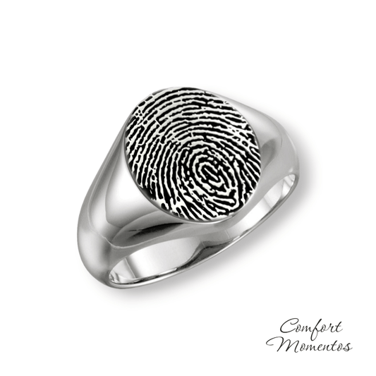 Silver oval signet ring with a fingerprint engraved in black