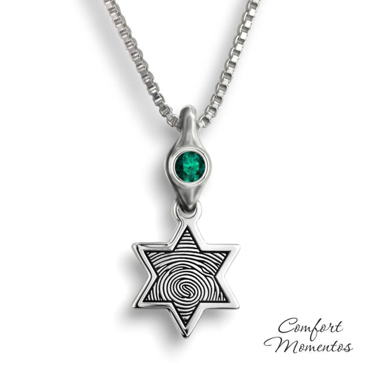 Small silver star necklace with a black fingerprint engraved, with a gemstone urn