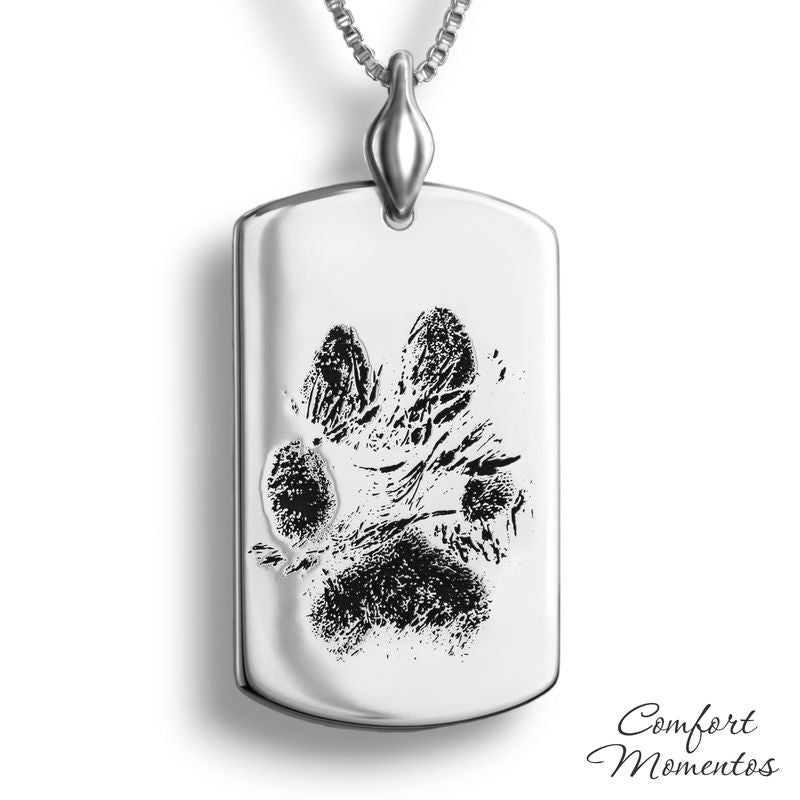 Large silver dog tag necklace with black pawprint engraving, with a plain urn