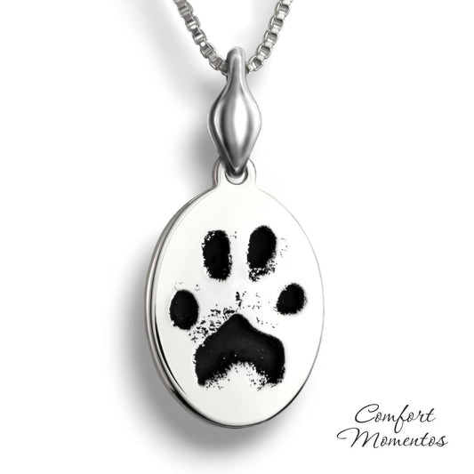 Silver oval necklace with black pawprint engraving, with a plain urn