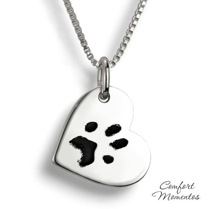 Silver heart necklace with black pawprint engraving